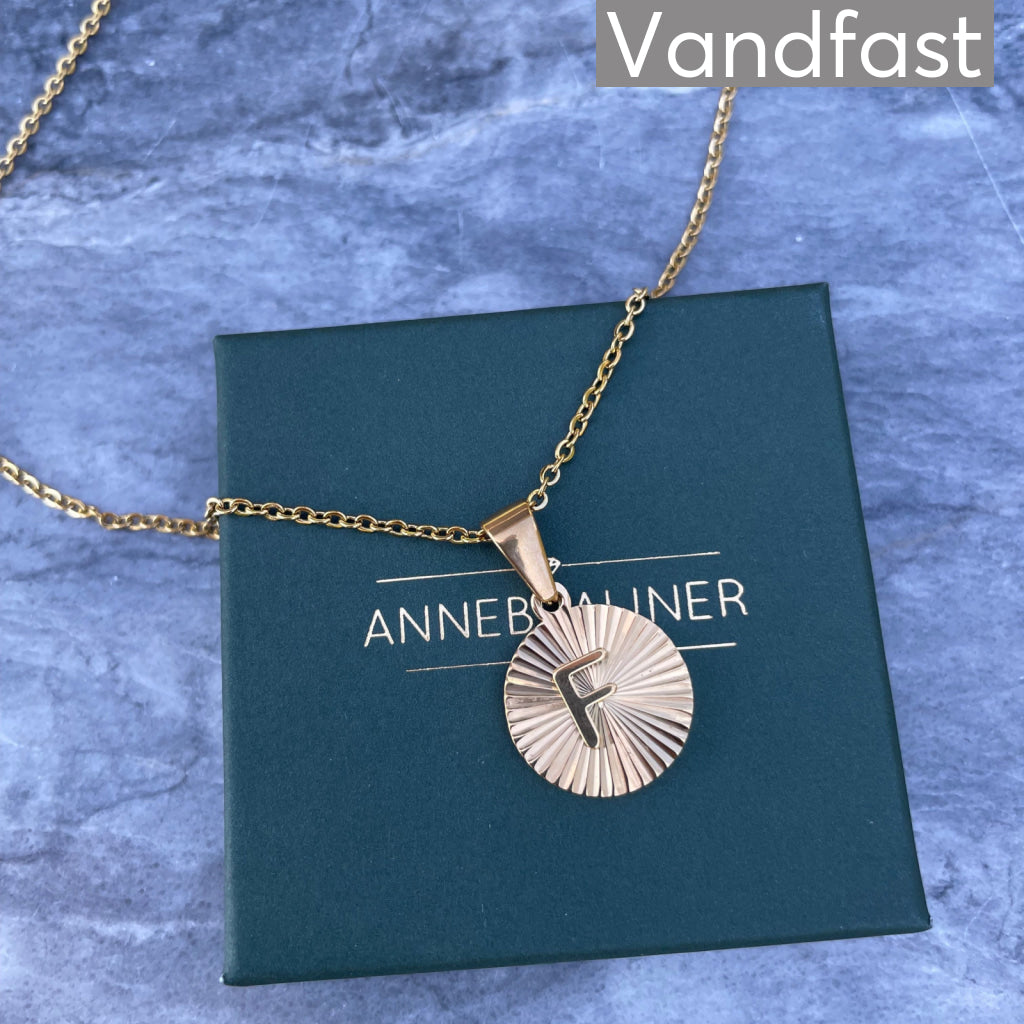 Annebrauner Solstråle Bogstav Halskæde - 18k Guldbelagt